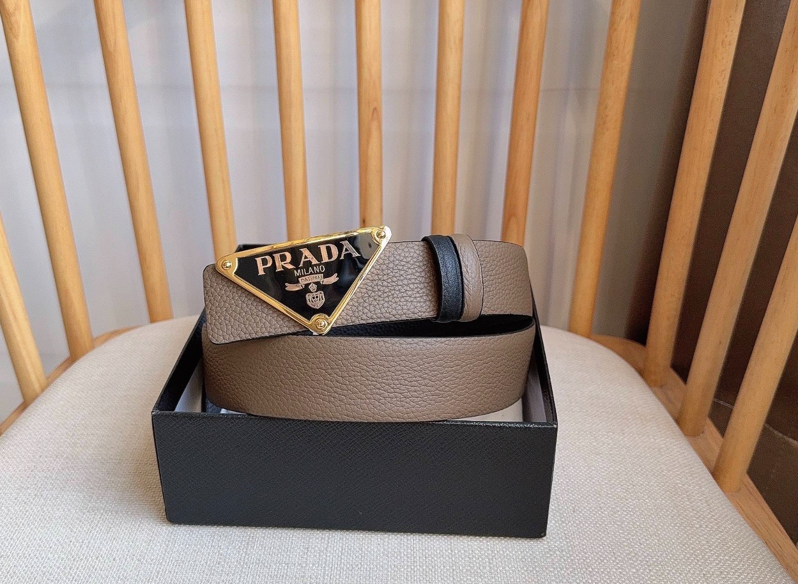 Prada men’s leather belt in Black/Brown