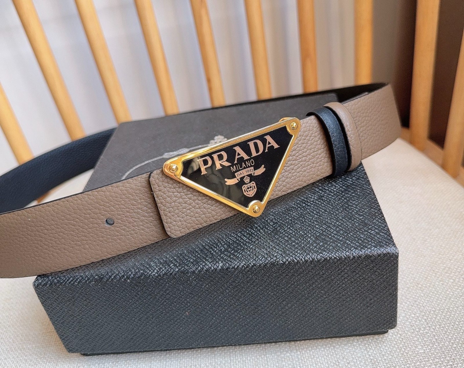 Prada men’s leather belt in Black/Brown