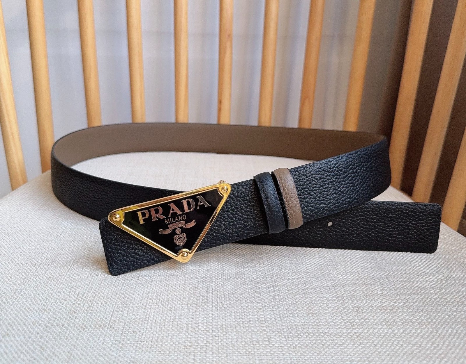 Prada men’s leather belt in Black/Brown